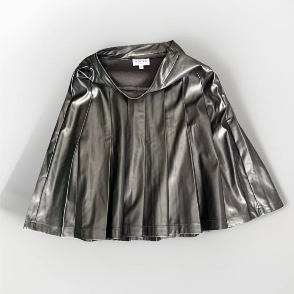 Adina pleated faux leather skirt featuring a high-waisted, flared design.